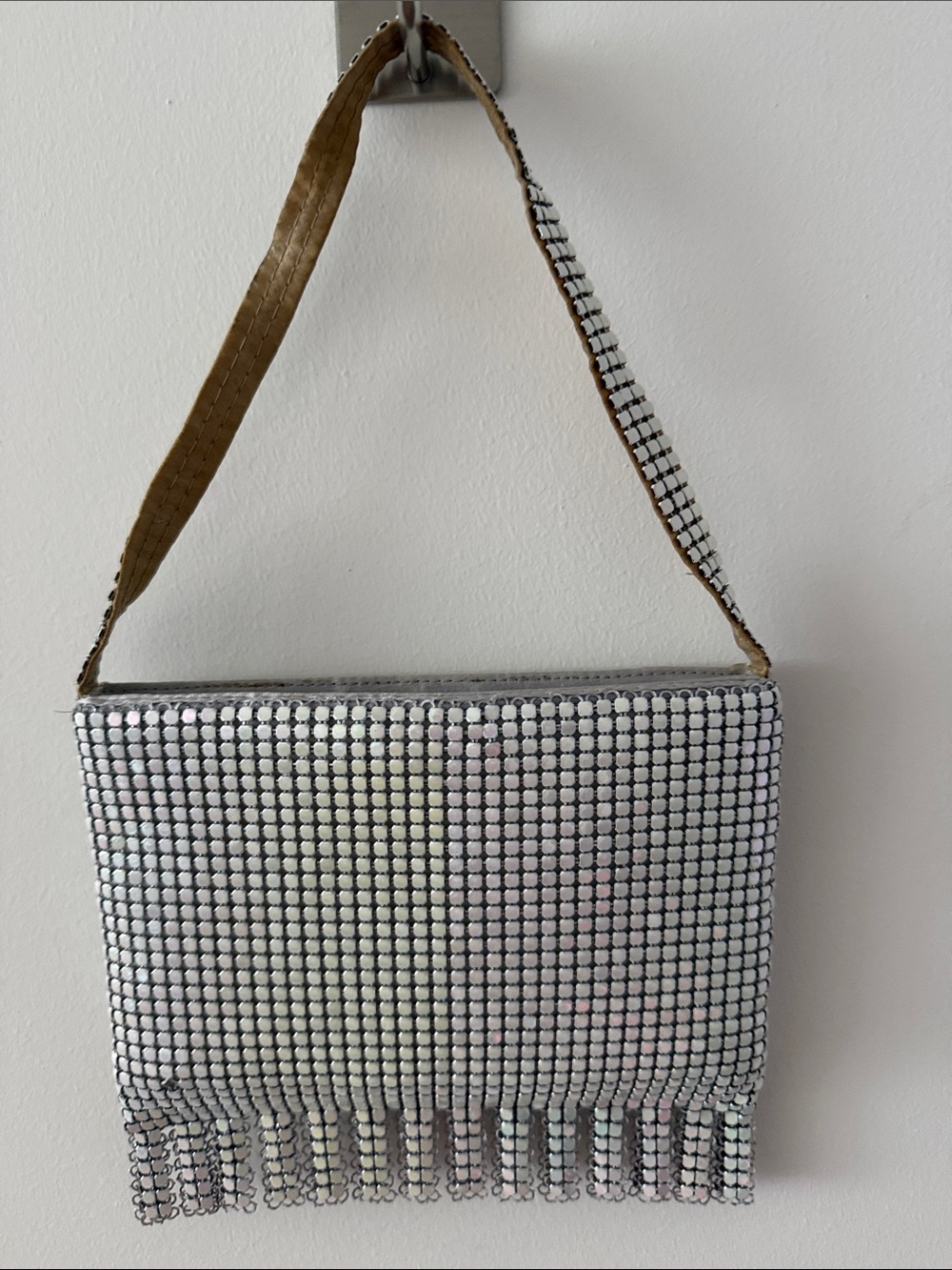 Marlo White Iridescent Mesh Bag With Top Strap & Fringe Along the Bottom.